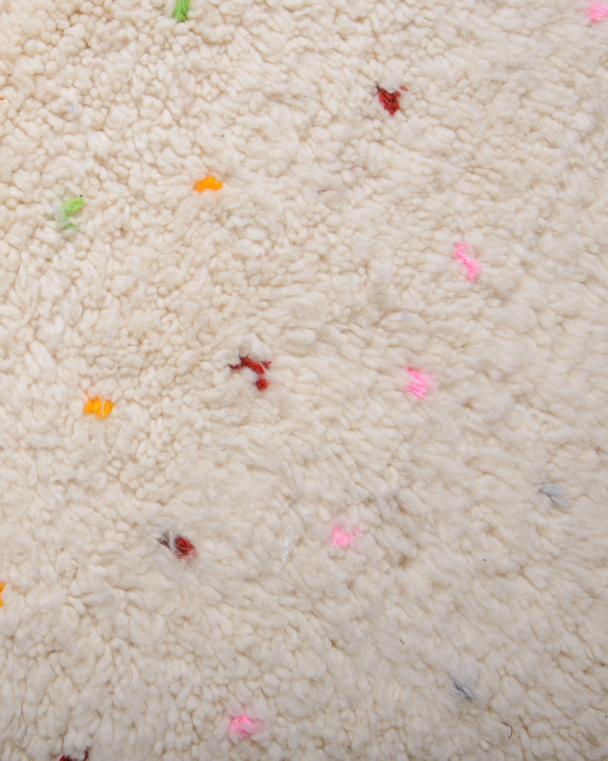 Modern, designer, handcrafted Berber rug from Morocco. Beniourain carpet with beautiful colours and patterns and fluffy wool texture.